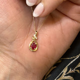 14K Yellow Gold 0.34CT 4x5mm Oval Ruby and 0.02 Carat Total Weight (4) Diamond Pendant