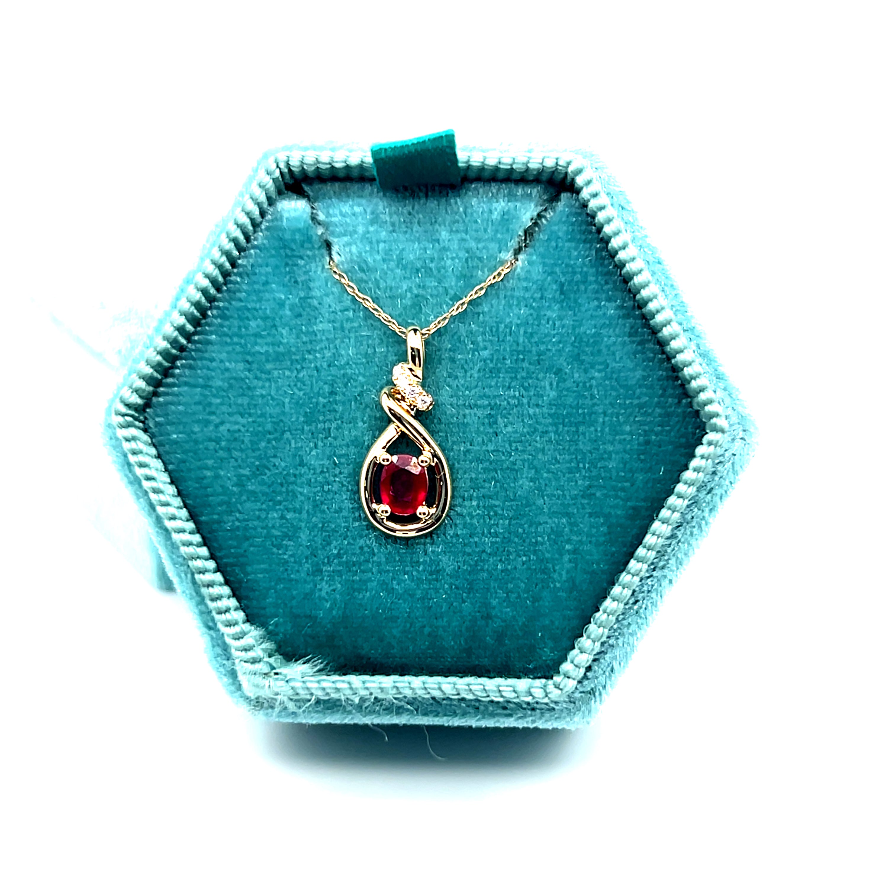 14K Yellow Gold 0.34CT 4x5mm Oval Ruby and 0.02 Carat Total Weight (4) Diamond Pendant
