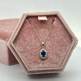 10K Yellow Gold 0.61CT Sapphire and 0.05 Carat Total Weight Diamond Fashion Pendant