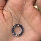 14K White Gold 2.50 Total Gem Weight (8) Oval Blue Sapphire Accented by 0.12 Carat Total Weight Natural Diamond Circle Pendant