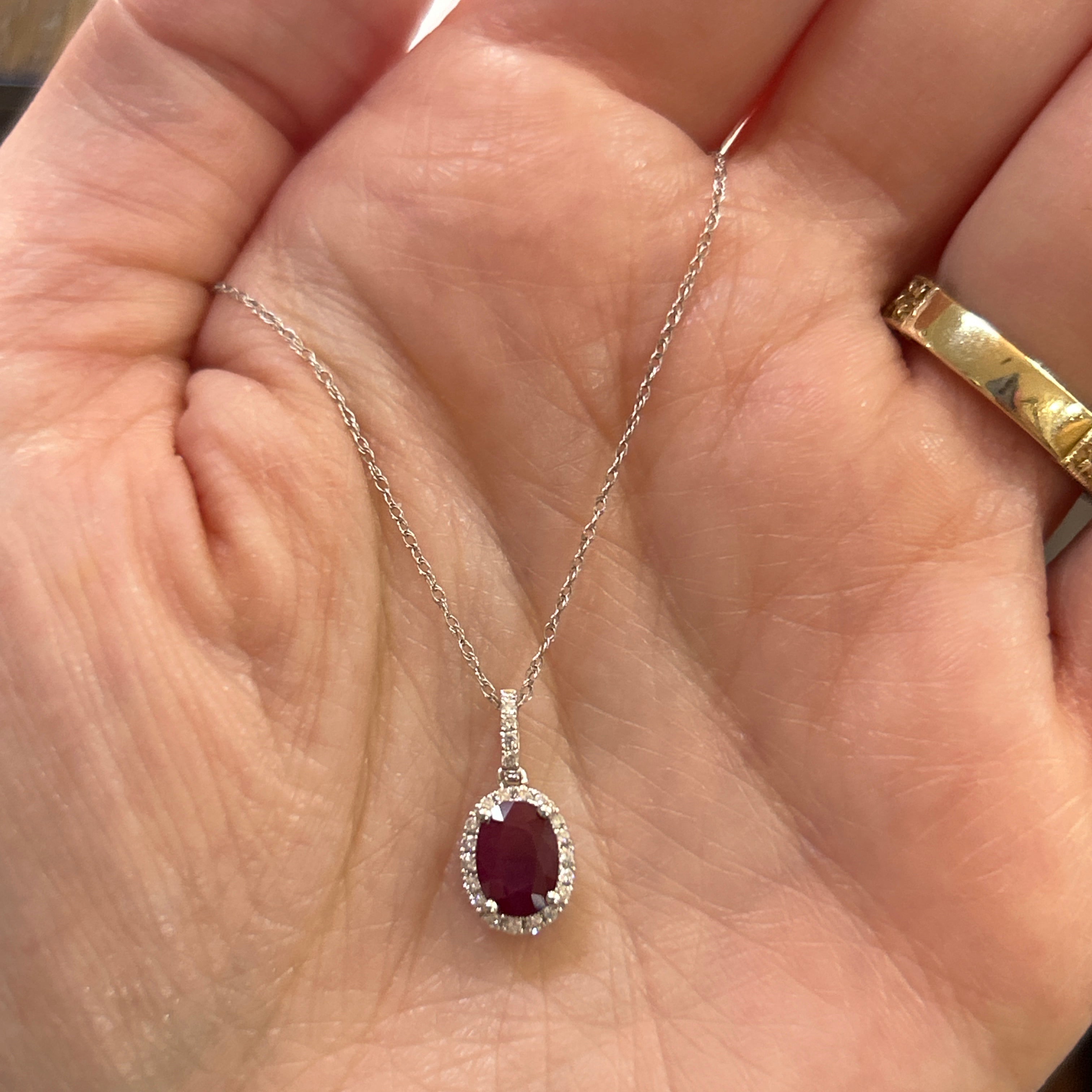 14K White Gold 0.80CT 5x7mm Ruby and 0.101 Carat Total Weight (23) Diamond Pendant