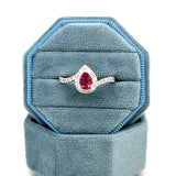 14K White Gold Pear Cut Ruby Ring with Diamond Accents - Bypass Style