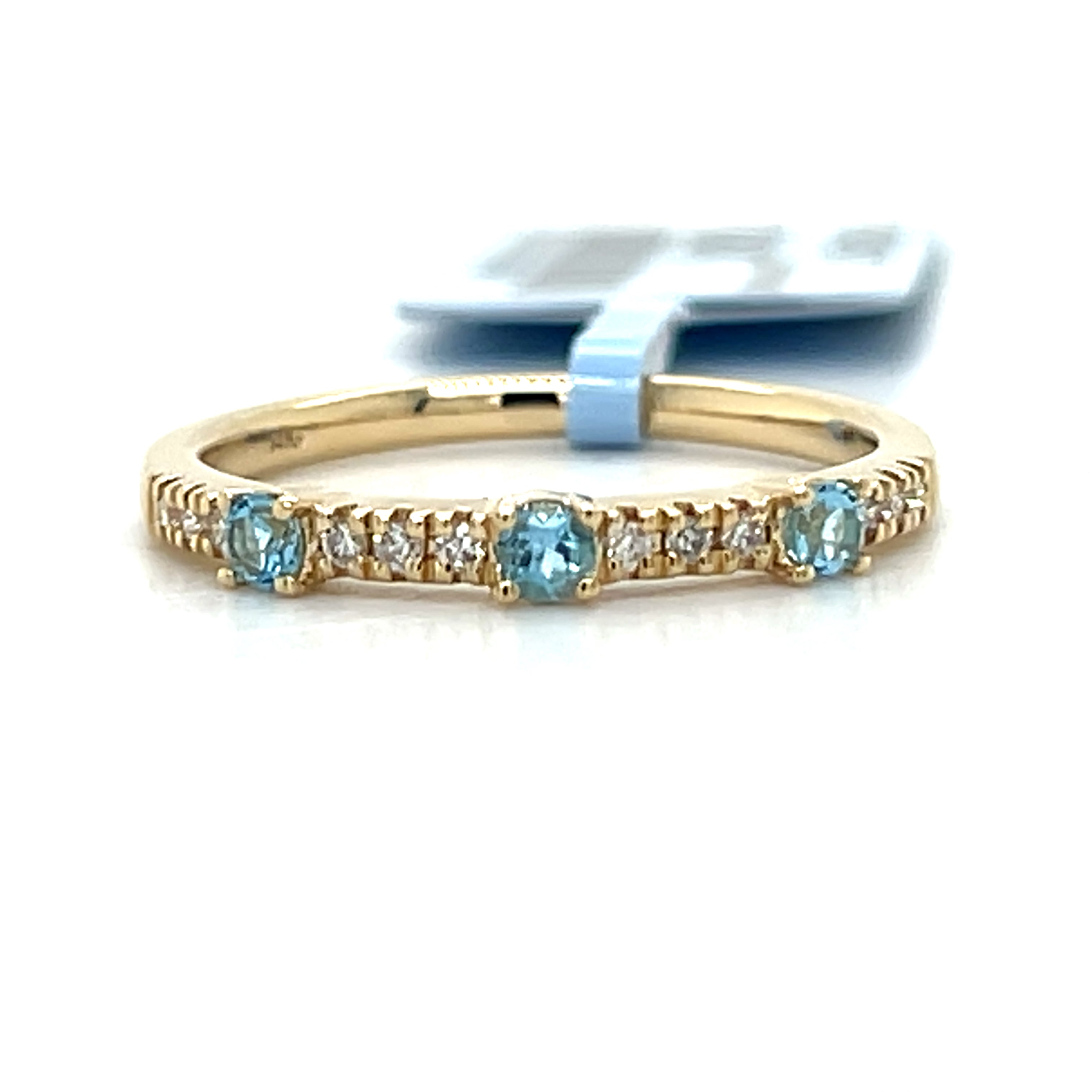 14K Yellow Gold 0.20 Carat Total Weight (3) Round Blue Topaz & 0.09 Carat Total Weight (12 )Round  Diamond Band Ring