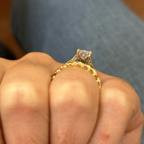 14K Yellow Gold 0.07 (10) Round Diamond Twisted Band Ring