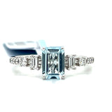 14K White Gold 0.94 CT (1) Aquamarine, 0.09 Carat Total Weight (2) Baguette Diamond & 0.13 Carat Total Weight (10) Round Diamond Ring
