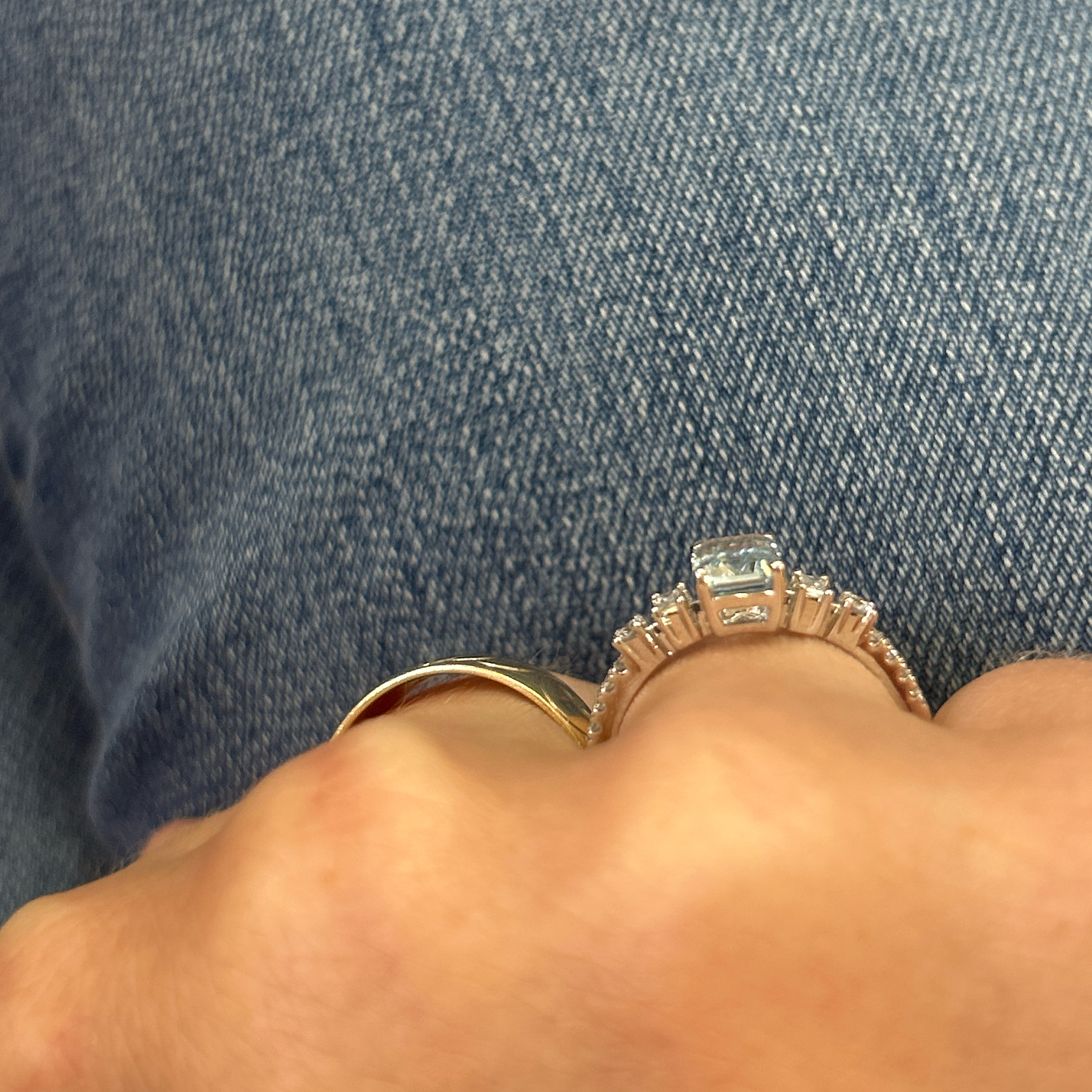 14K White Gold 0.94 CT (1) Aquamarine, 0.09 Carat Total Weight (2) Baguette Diamond & 0.13 Carat Total Weight (10) Round Diamond Ring