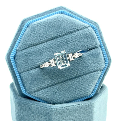 14K White Gold 0.94 CT (1) Aquamarine, 0.09 Carat Total Weight (2) Baguette Diamond & 0.13 Carat Total Weight (10) Round Diamond Ring