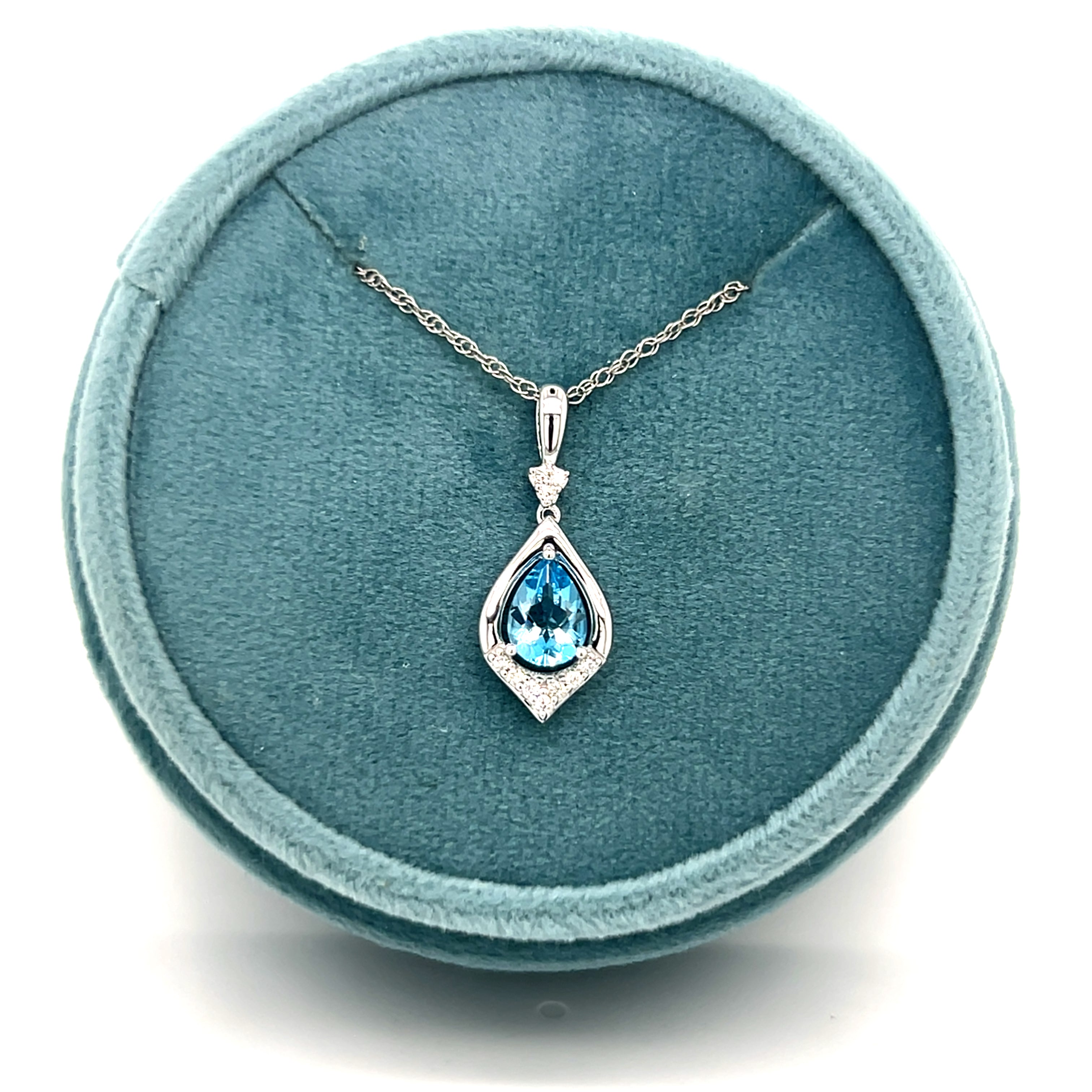 14K White Gold 0.78CT (1) Pear Blue Topaz & 0.07 Carat Total Weight (10) Round Diamond Pendant