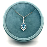 14K White Gold 0.78CT (1) Pear Blue Topaz & 0.07 Carat Total Weight (10) Round Diamond Pendant