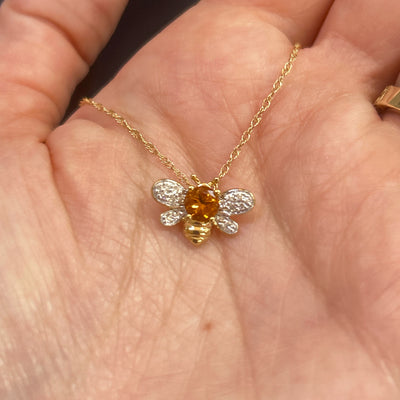 14K Yellow and White Gold 0.43CT (1) Round Citrine & 0.12 Carat Total Weight (16) Round Diamond Pendant
