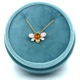 14K Yellow and White Gold 0.43CT (1) Round Citrine & 0.12 Carat Total Weight (16) Round Diamond Pendant