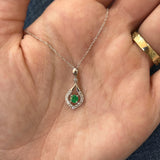10K White Gold 0.18CT Emerald and 0.13 Carat Total Weight Diamond Pendant