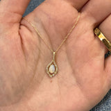 14K Yellow Gold 0.30CT Teardrop Opal and 0.10 Carat Total Weight Diamond Pendant