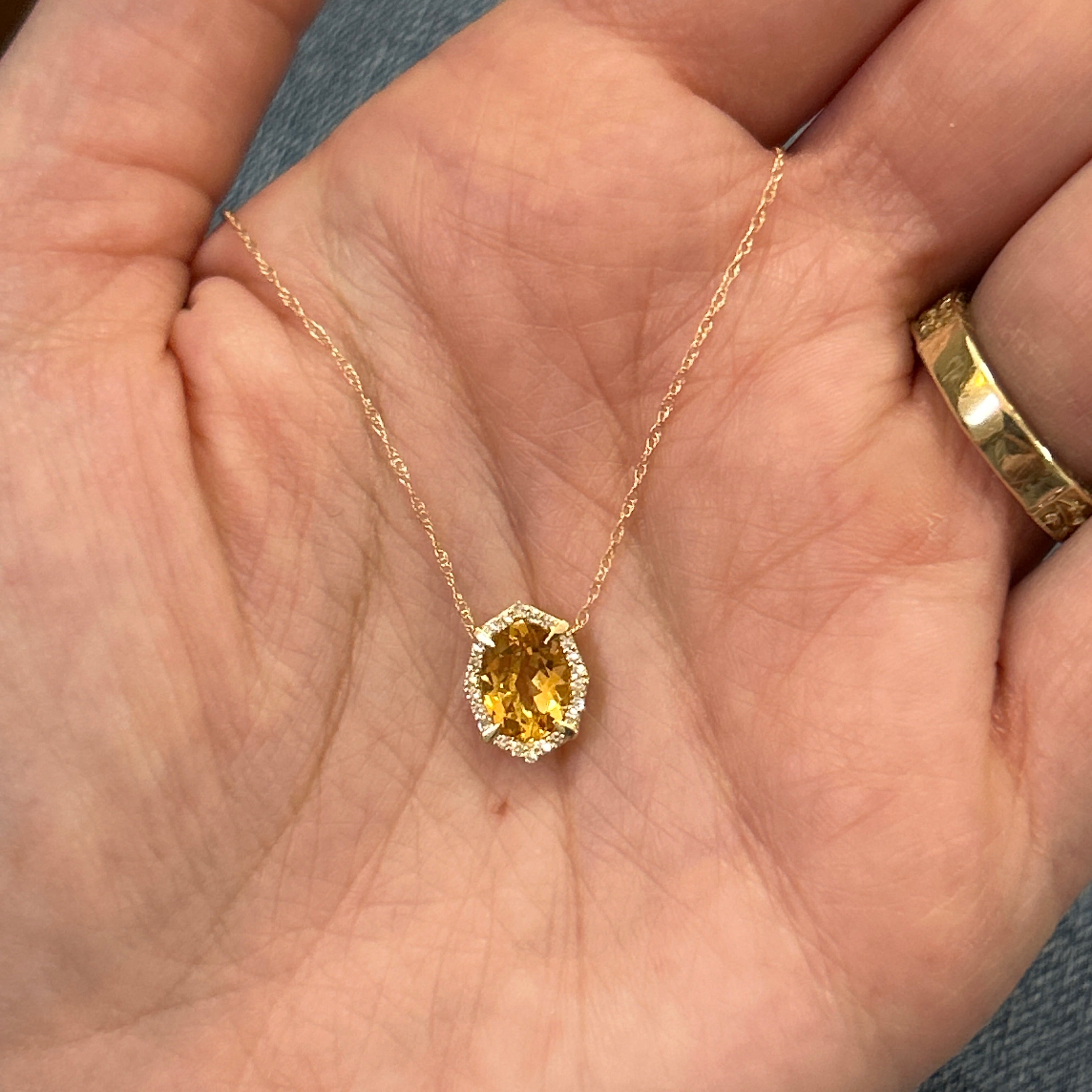 10K Yellow Gold 1.00CT Oval Citrine and 0.10 Carat Total Weight Diamond Pendant