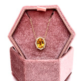 10K Yellow Gold 1.00CT Oval Citrine and 0.10 Carat Total Weight Diamond Pendant