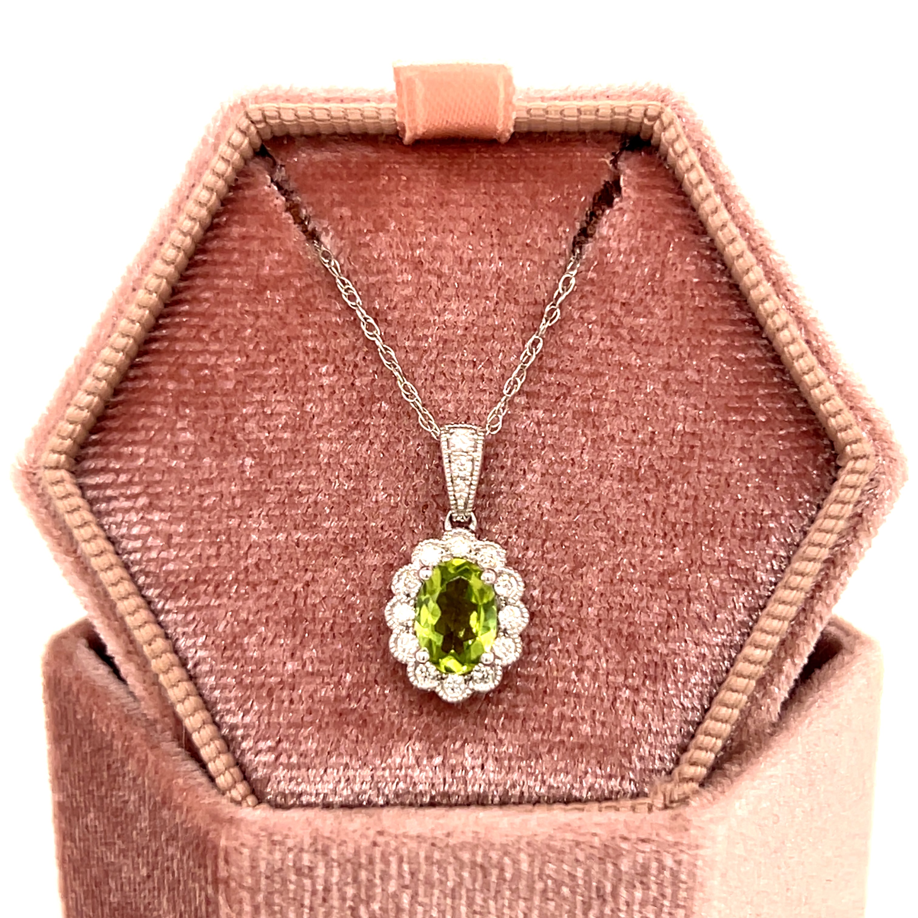 10K White Gold Oval Peridot and 0.15 Carat Total Weight Floral Diamond Pendant