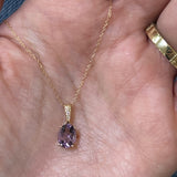 14K Yellow Gold 0.49g 1.16CT Oval Amethyst and 0.03 Carat Total Weight (3) Round Diamond Pendant