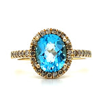 Yellow Gold Checkerboard Cut Oval Blue Topaz and Diamond Ring