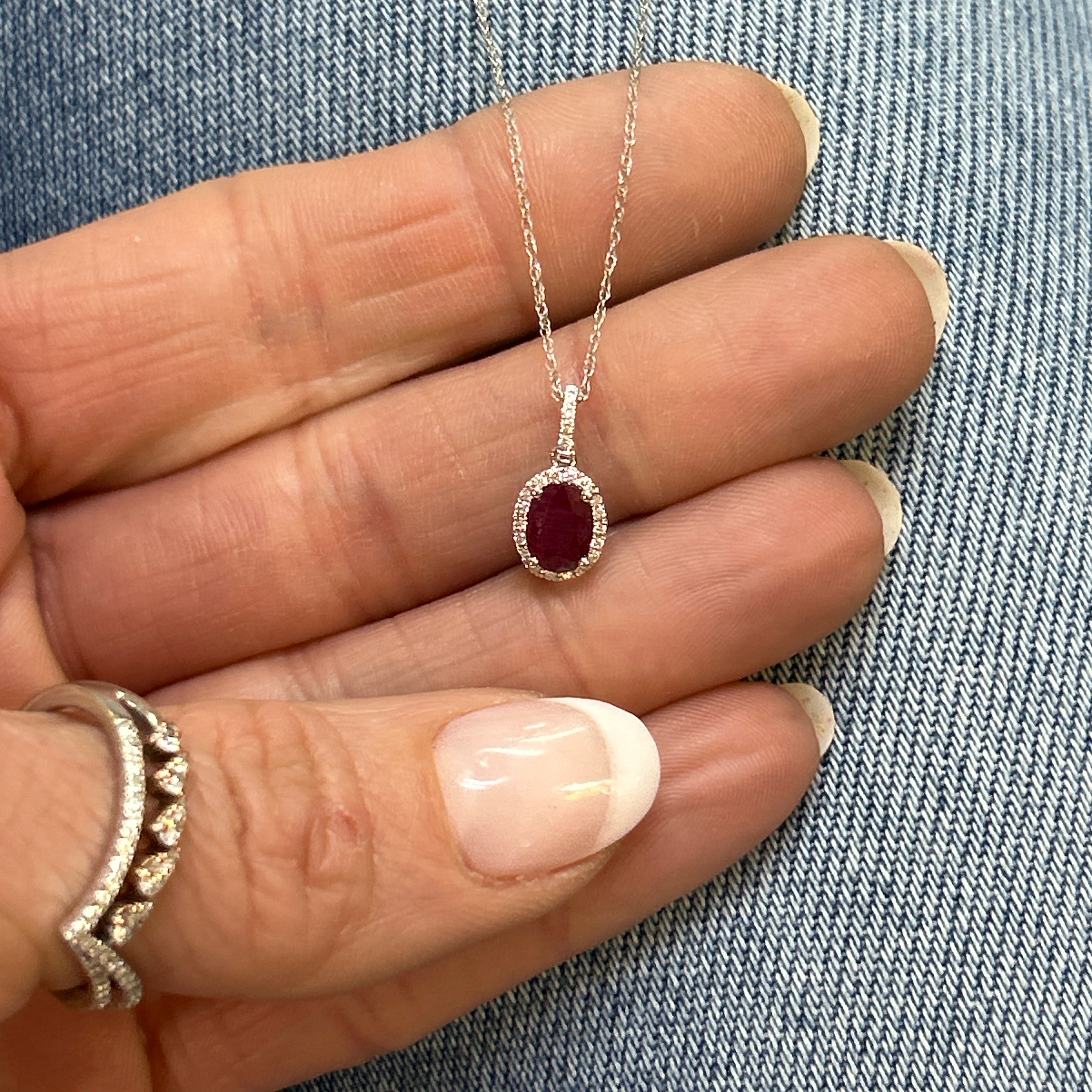 14K White Gold 0.80CT 5x7mm Ruby and 0.101 Carat Total Weight (23) Diamond Pendant