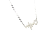 Silver Heartbeat Pendant Necklace