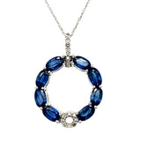 14K White Gold 2.50 Carat Total Weight (8) Oval Blue Sapphire Accented by 0.12 Carat Total Weight Natural Diamond Circle Pendant
