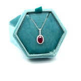 14K White Gold 0.80CT 5x7mm Ruby and 0.101 Carat Total Weight (23) Diamond Pendant