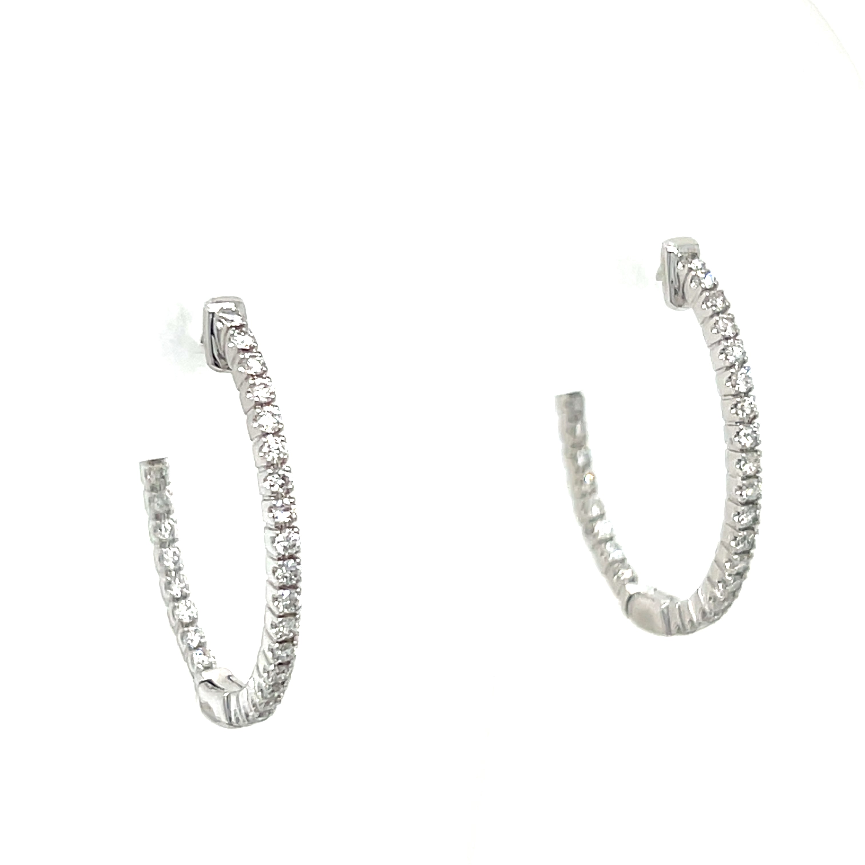 14K White Gold 4.2g 0.55 Carat Total Weight Round Brilliant Cut Natural Diamond Oval Shaped Push Release Inside-Outside 1" Hoop Earrings.  Available online or in store at Wright’s Jewelry, Fallston, NC