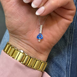 14K White Gold 2.07CT Trillion Glacier Blue Topaz and 0.054 Carat Total Weight (6) Diamond Pendant