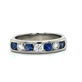 "Annmarie" Palladium 0.56 Carat Total Weight (4) Sapphire and 0.24 Carat Total Weight (3) Diamond Wedding Anniversary Band Estate SVLTB225