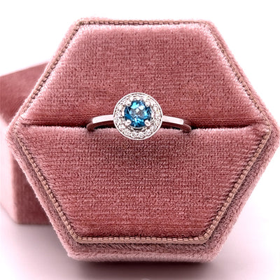 14K White Gold .58CT Round London Blue Topaz and .12 Carat Total Weight Diamond Ring