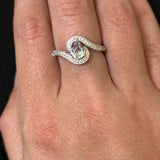 White Gold Pear-Shaped Aquamarine and Diamond Swirl Halo Ring
