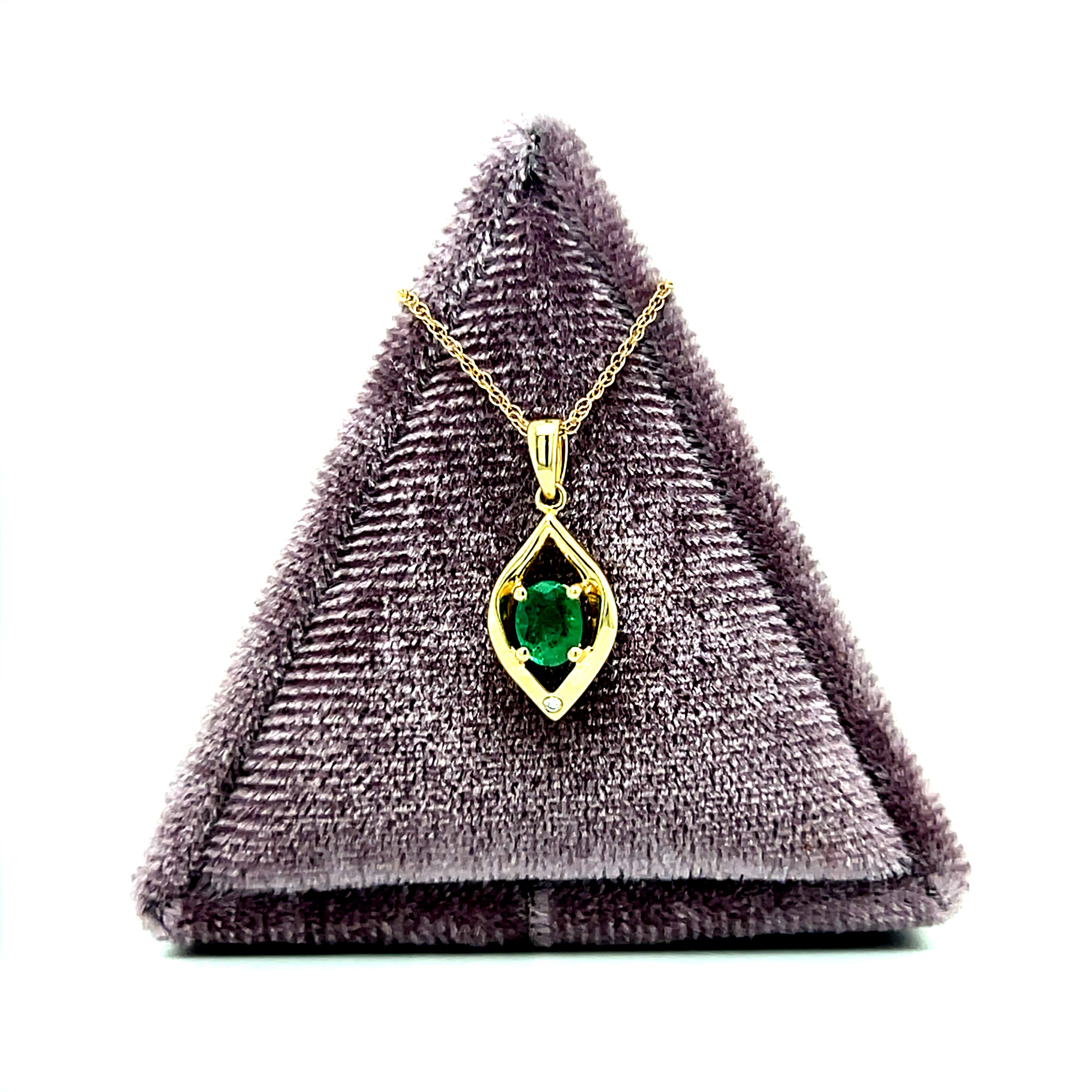 14K Yellow Gold 0.25CT 4x5mm Oval Emerald and 0.007CT (1) Diamond Pear-Shaped Pendant
