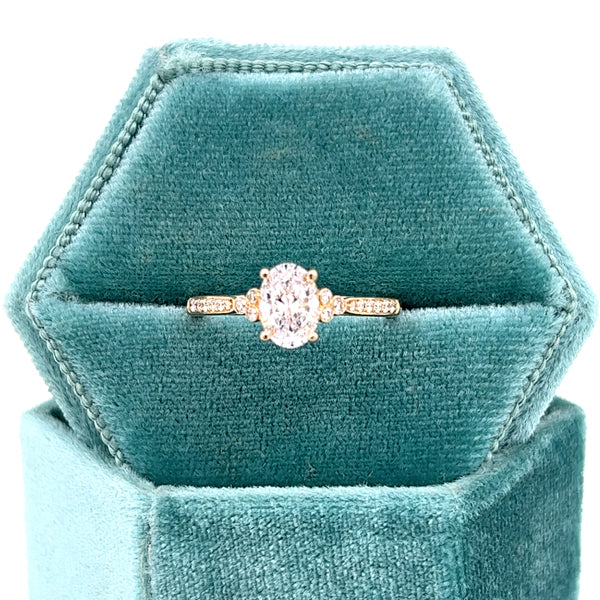 14K Yellow Gold .12 Carat Total Weight VS2-SI1 Clarity, FG Color Diamond 7x5mm Oval Center Semi Mount Bridal Engagement Ring