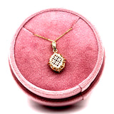 Yellow Gold Tanzanite and White Diamond Pendant