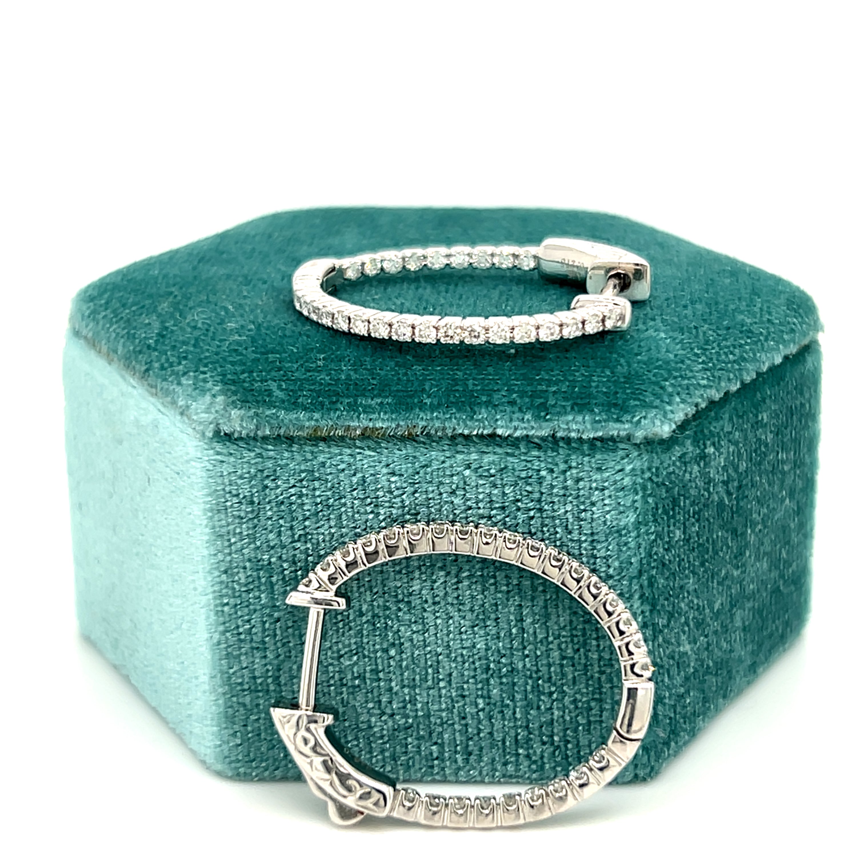 14K White Gold 4.2g 0.55 Carat Total Weight Round Brilliant Cut Natural Diamond Oval Shaped Push Release Inside-Outside 1" Hoop Earrings.  Available online or in store at Wright’s Jewelry, Fallston, NC